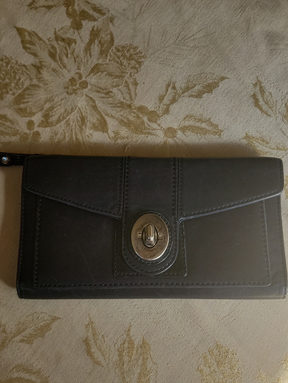 COACH black leather wallet with Embossed Logo